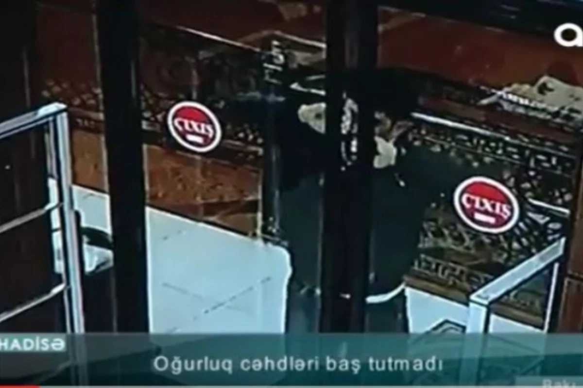 Bakıda oğru qapını qırıb mağazaya girdi, polis yaxaladı (VİDEO)