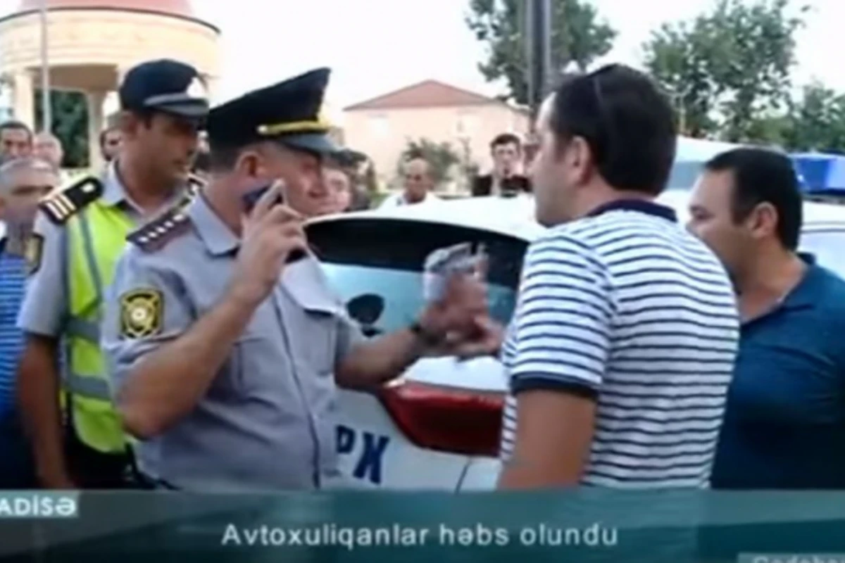 Avtoxuliqanlıq edən sürücü polislə əlbəyaxa çıxdı (VİDEO)