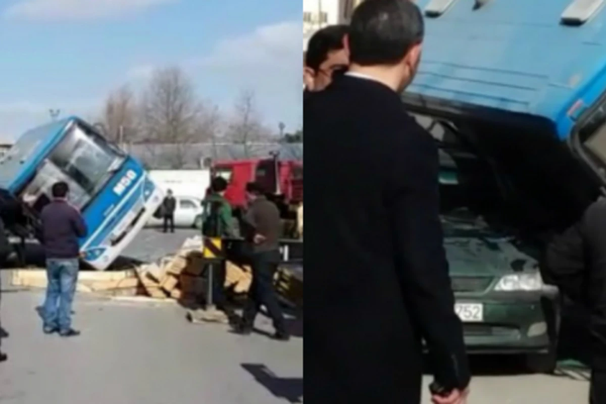 Bakıda içi sərnişin dolu avtobus maşının üzərinə aşdı (VİDEO)