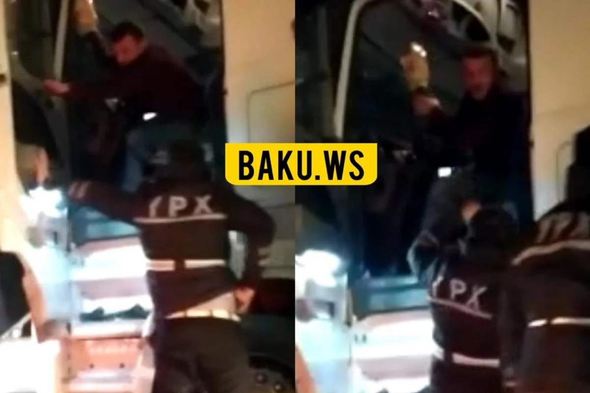 Bakıda sürücü ayağını çıxarıb polisi vurmaq istədi - VİDEO