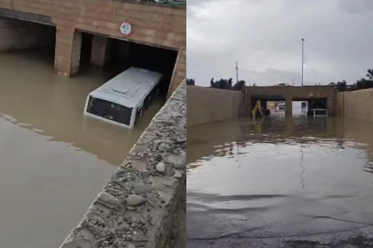 Bakıda sərnişin avtobusu suyun içində qaldı - Sərnişinlər kəndirlə xilas edildi