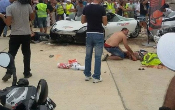 “Porsche”yoldan çıxaraq tamaşaçılara çırpıldı (FOTO, VİDEO)