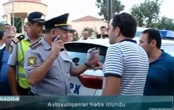 Avtoxuliqanlıq edən sürücü polislə əlbəyaxa çıxdı (VİDEO)