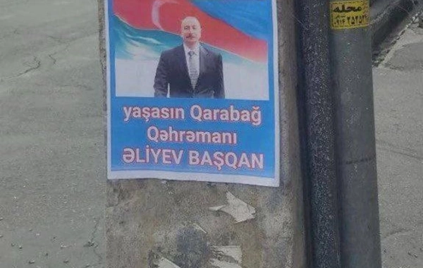 Güney Azərbaycandan Amuliyə cavab: İlham Əliyev və Ərdoğanın şəkilləri divarlara vurulub