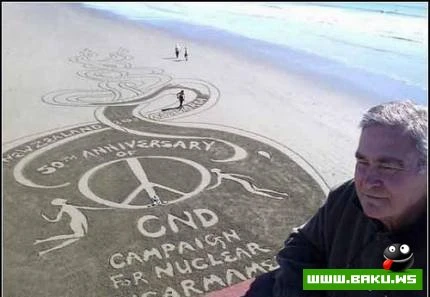 Dənizqırağı qum üzərində gözəl şəkillər