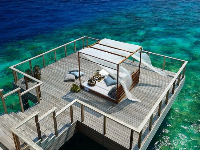 Отель Dusit Thani Maldives на острове Баа Атолл