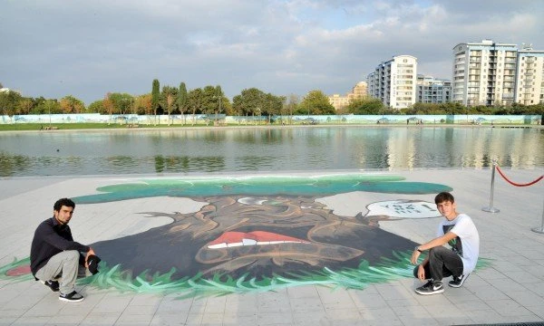 Лейла Алиева с сыновьями на открытии проекта 3D граффити в парке Деде Горгуд