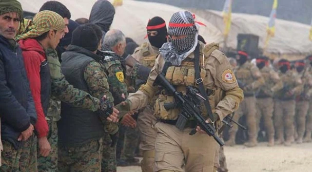 ABŞ əsgərlərinin terrorçulara təlim keçdiyi şok görüntülər ortaya çıxdı (VİDEO)