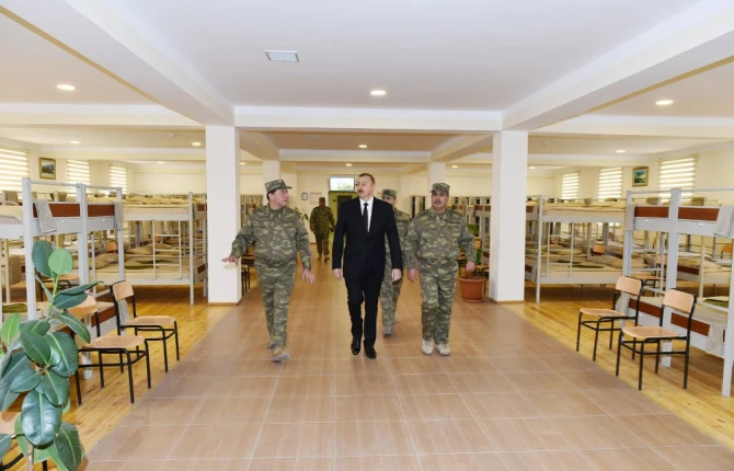 Prezident tapançanı götürüb nişan aldı (VİDEO, FOTO)