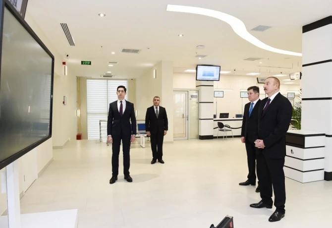 Президент на открытии нового Пространства оказания имущественных услуг - ФОТО