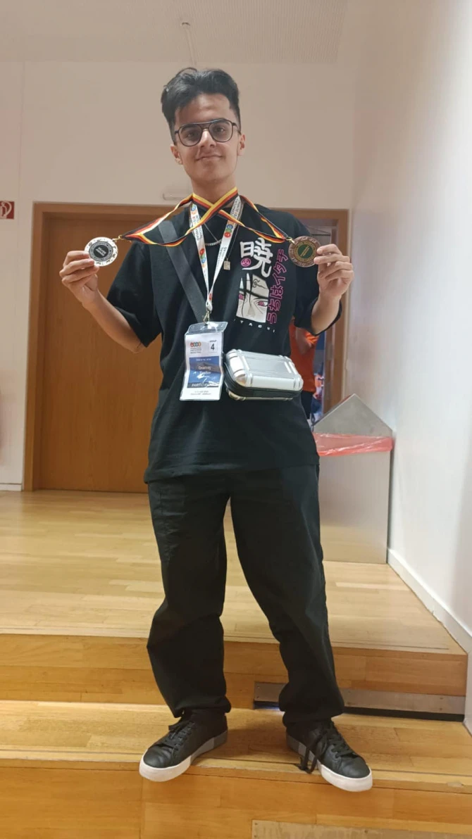 Tanınmış cütlüyün övladı gümüş medal qazandı - FOTO