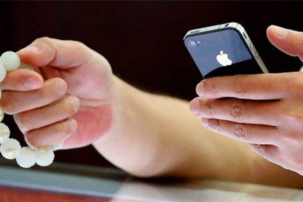 Фанаты Apple выстроились в очередь за новыми iPhone