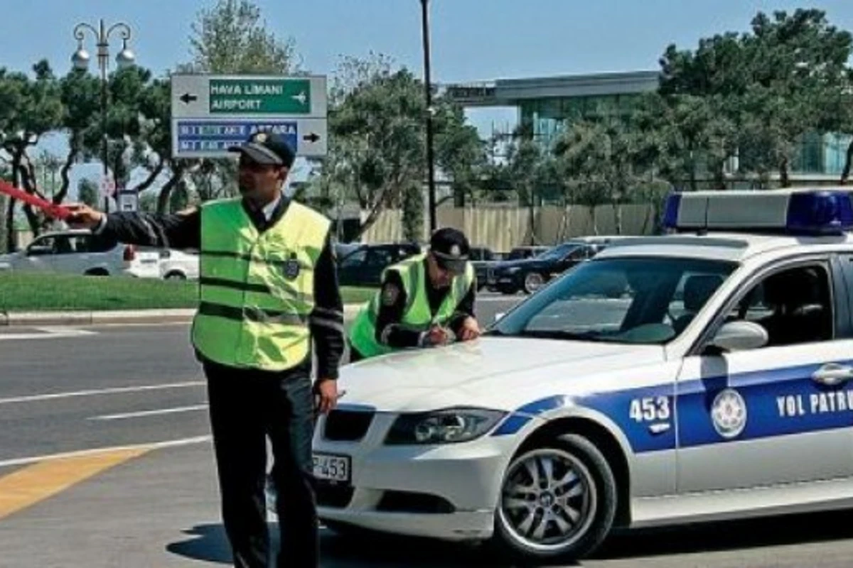 Очередной спор между водителем и сотрудником дорожной полиции в Азербайджане (видео)