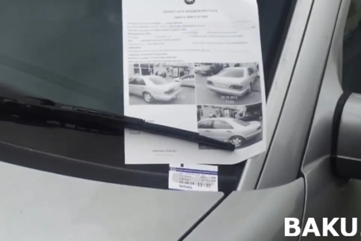 В Баку ГАИ на платных стоянках штрафуют за неправильную парковку (видео)