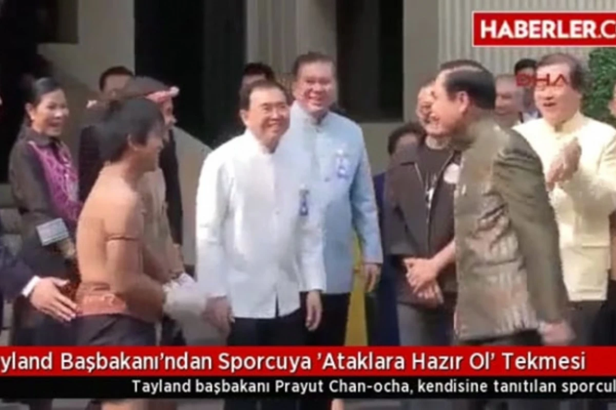 Taylandın baş naziri idmançını təpiklə vurdu (VİDEO)