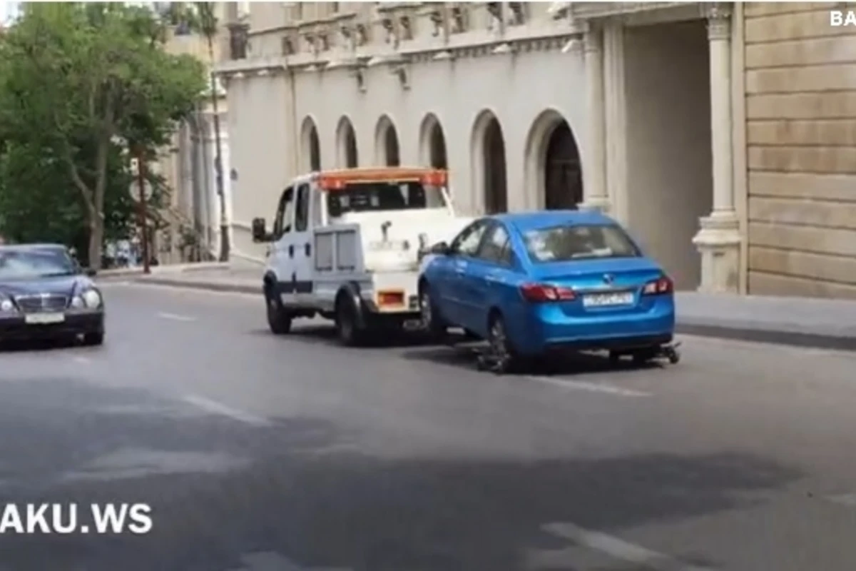 Произвол водителя эвакуатора в центре Баку (видео)
