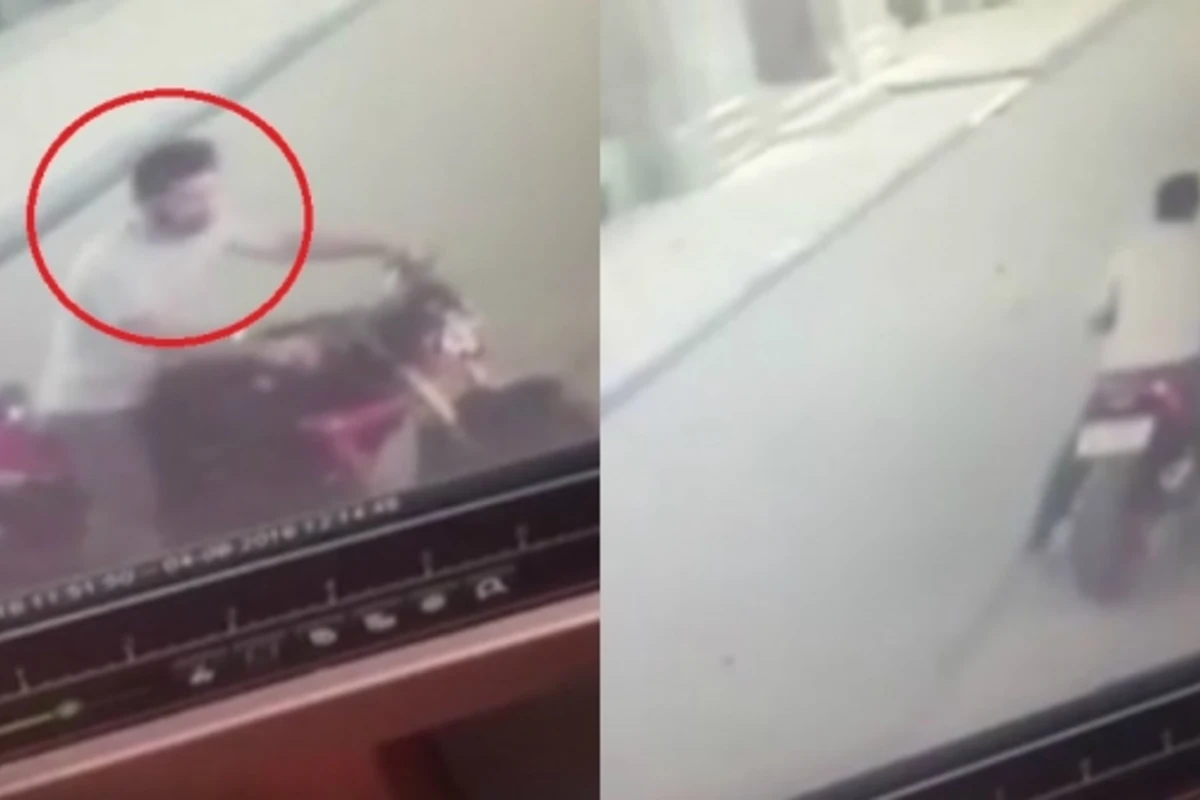 Bakıda motosiklet oğrusu kameraya düşdü (VİDEO) Bakıda motosiklet oğrusu kameraya düşdü (VİDEO)
