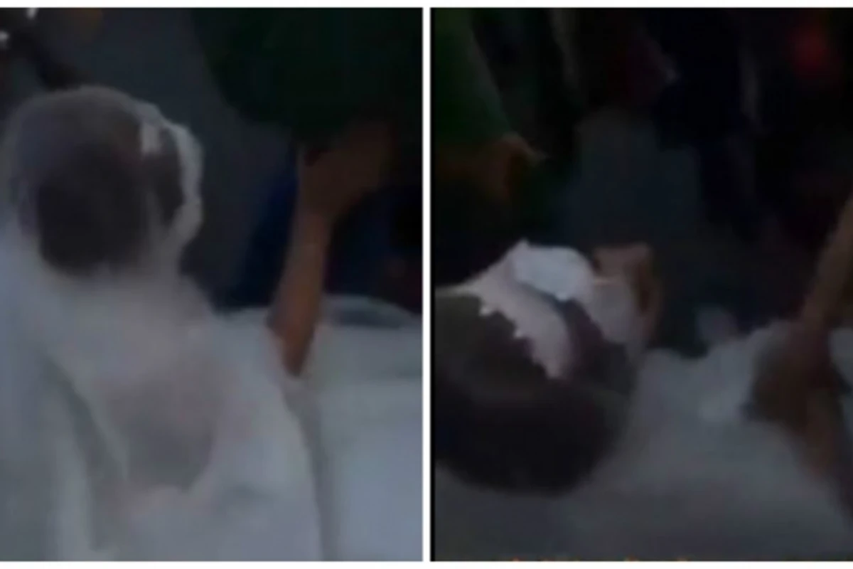 В день свадьбы полиция поволокла по земле невесту (видео)