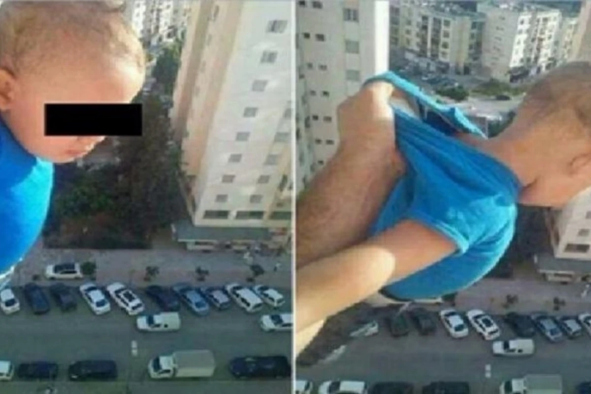 Мужчина вывесил ребенка из окна ради лайков (фото)
