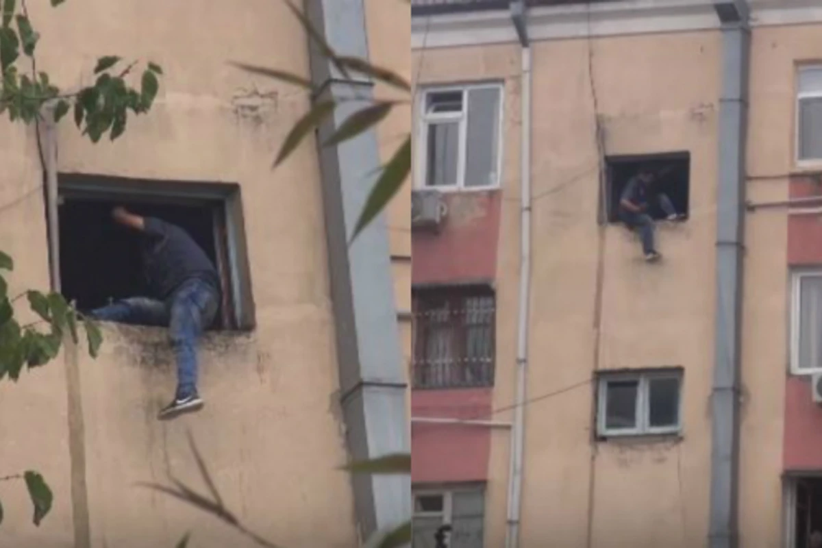 В Баку молодой человек пытался выброситься с 4-го этажа (видео) В Баку молодой человек пытался выброситься с 4-го этажа (видео)