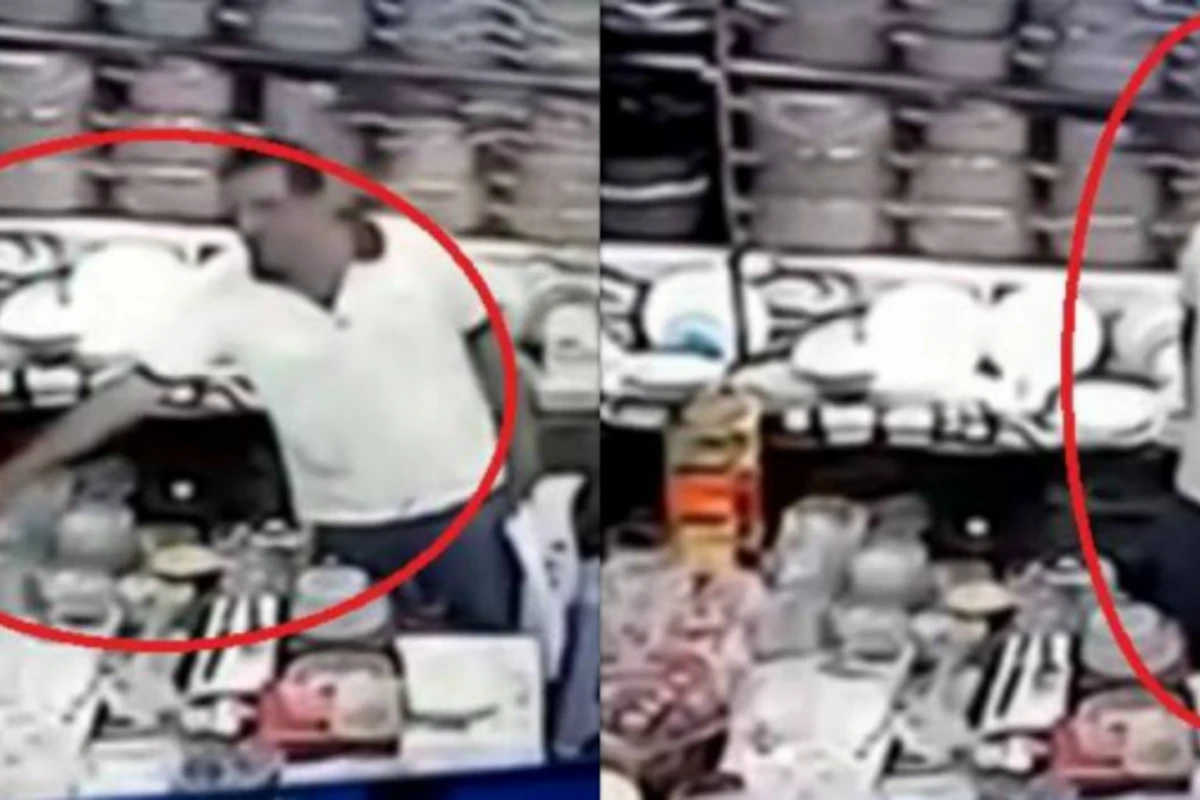 Укравший деньги в одном из магазинов популярного ТЦ в Баку попал на камеру (видео) Укравший деньги в одном из магазинов популярного ТЦ в Баку попал на камеру (видео)