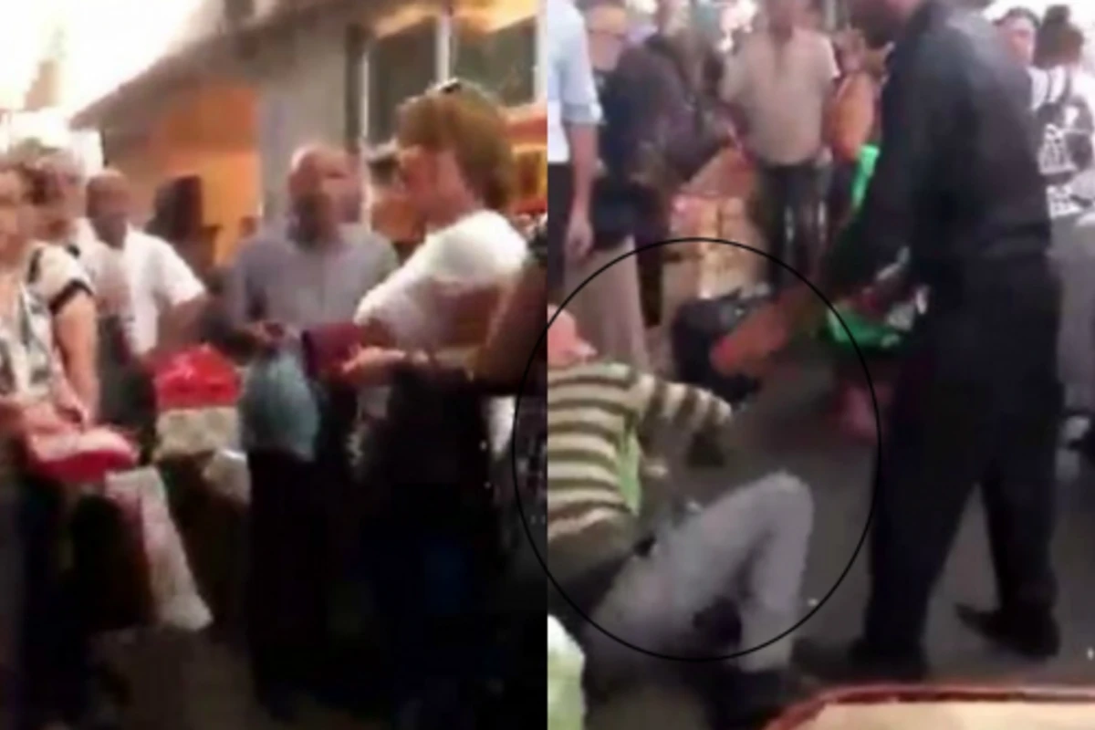 Bakıda bazarda qadın kişini bir zərbə ilə yerə sərdi (VİDEO) Bakıda bazarda qadın kişini bir zərbə ilə yerə sərdi (VİDEO)