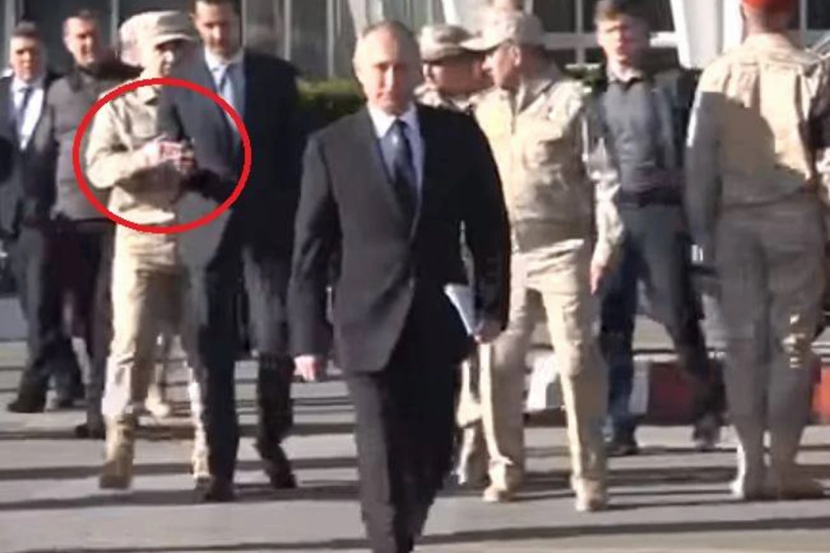 Российский офицер не подпустил Асада к Путину (видео)