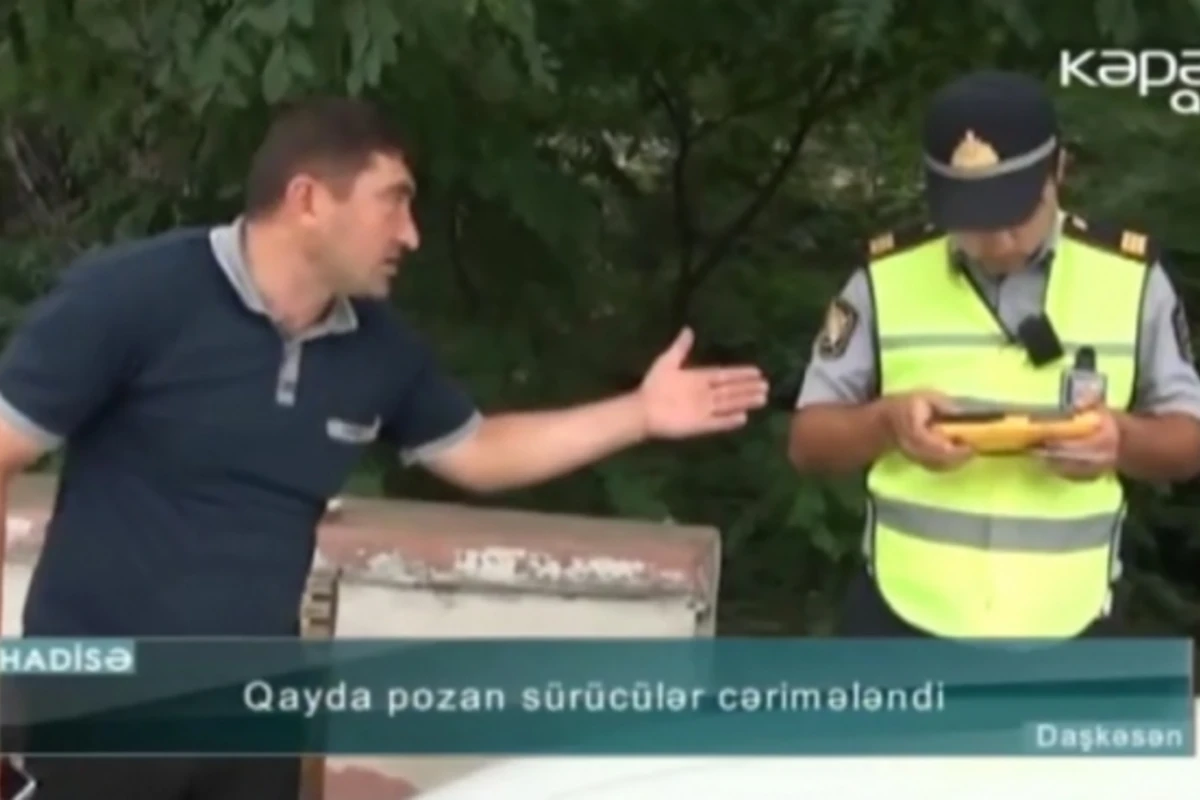 Sürücü polisə etiraz etdi: Dedim yazma, yekə kişisən (VİDEO) Sürücü polisə etiraz etdi: Dedim yazma, yekə kişisən (VİDEO)