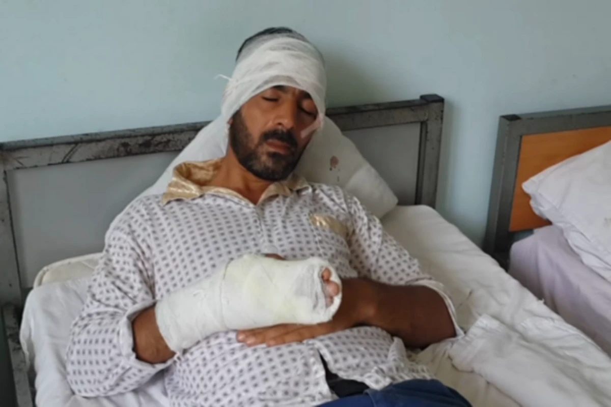 Azərbaycanda dəhşət: 40 yaşlı kişinin qulağını kəsmək istədilər - VIDEO