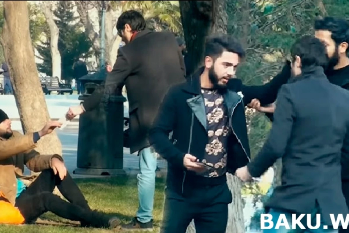 Bomj ona verilən 100 AZN-i cırdı və görün nə oldu... - VİDEO