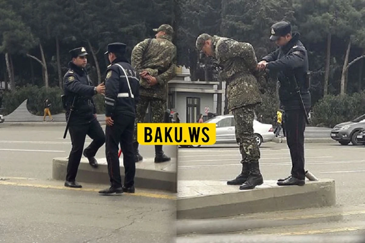 Bakıda yağışlı havada polislər əsgərə yardım etdilər – FOTO Bakıda yağışlı havada polislər əsgərə yardım etdilər – FOTO