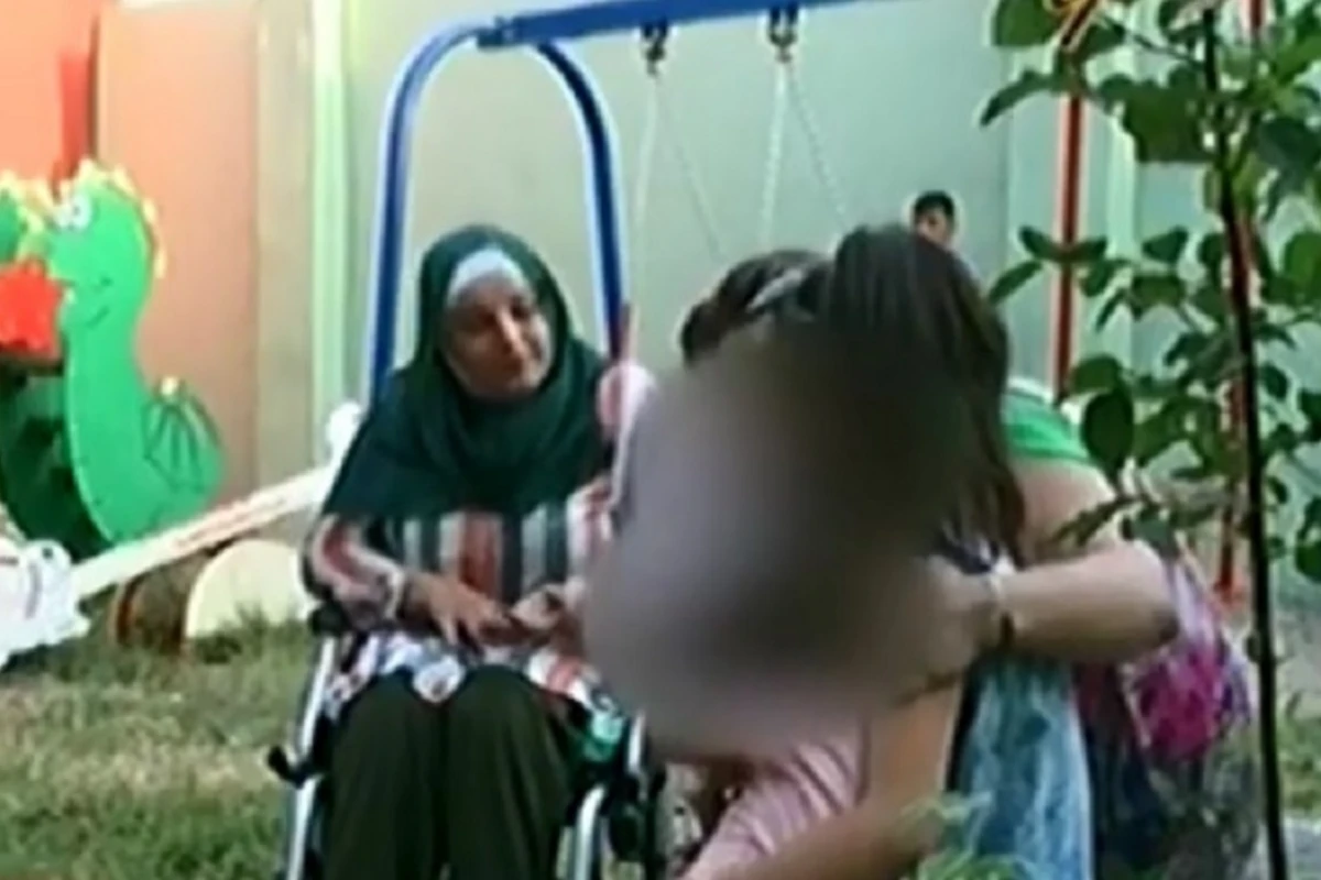 Bakıda evsiz qalan uşaqlara fiziki qüsurlu xanım sahib çıxdı - VİDEO