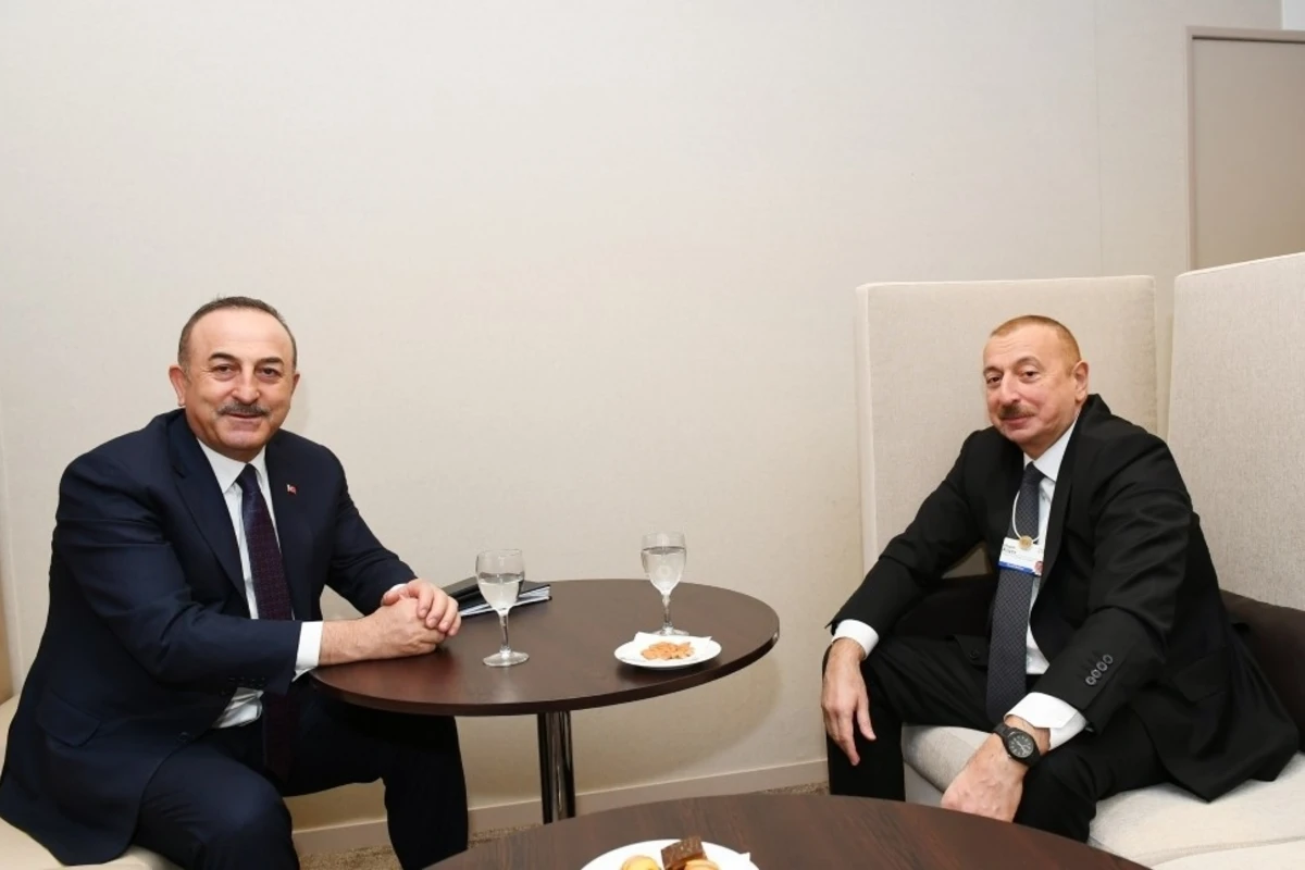 İlham Əliyev Davosda Türkiyənin Xarici İşlər naziri ilə görüşüb
