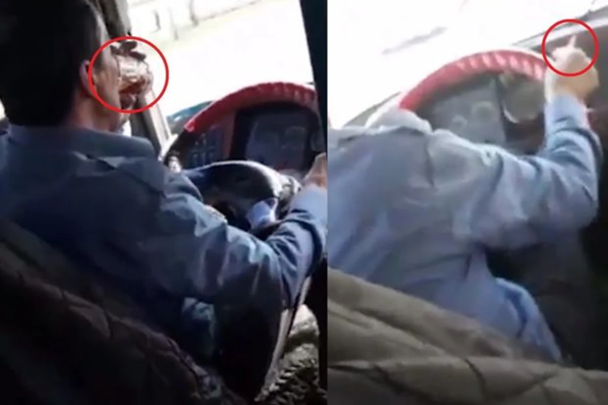 Bakıda sürücü avtobusda istirahət edir: Çay, telefon, siqaret - VİDEO Bakıda sürücü avtobusda istirahət edir: Çay, telefon, siqaret - VİDEO