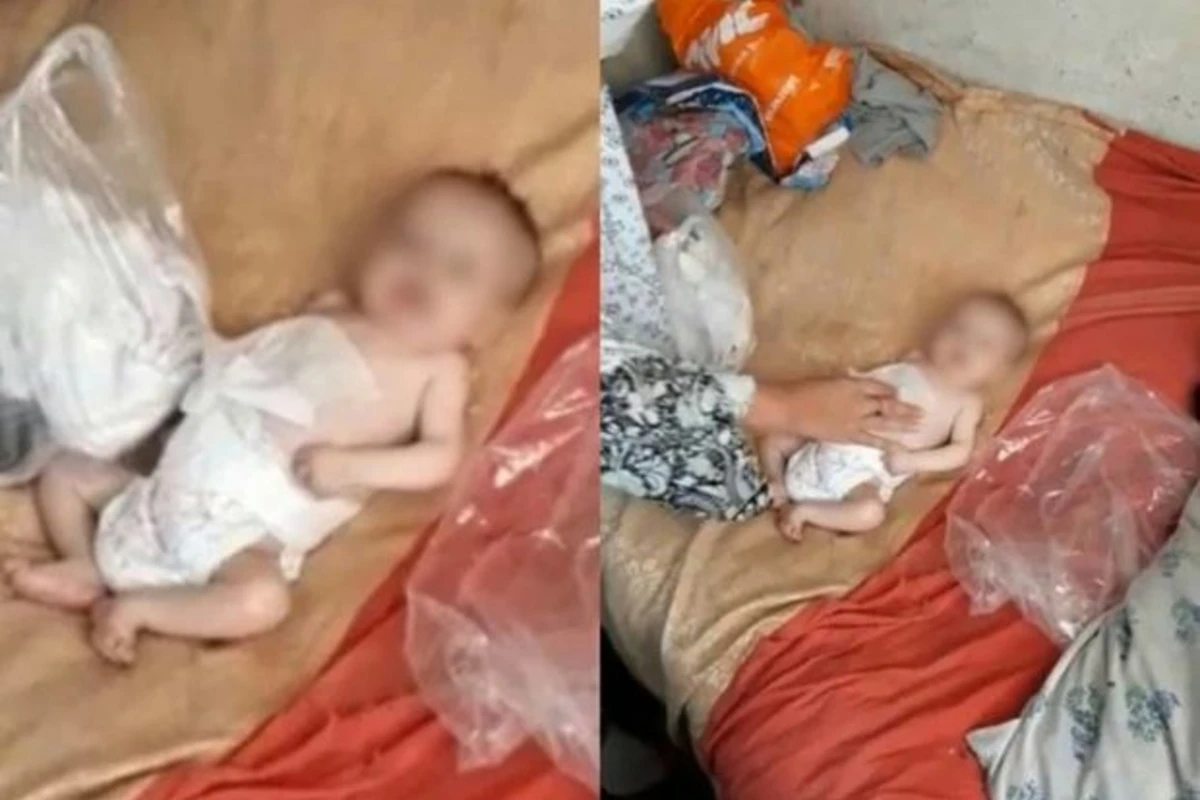 В Баку душевнобольная мать чуть не довела своего ребенка до смерти - ВИДЕО