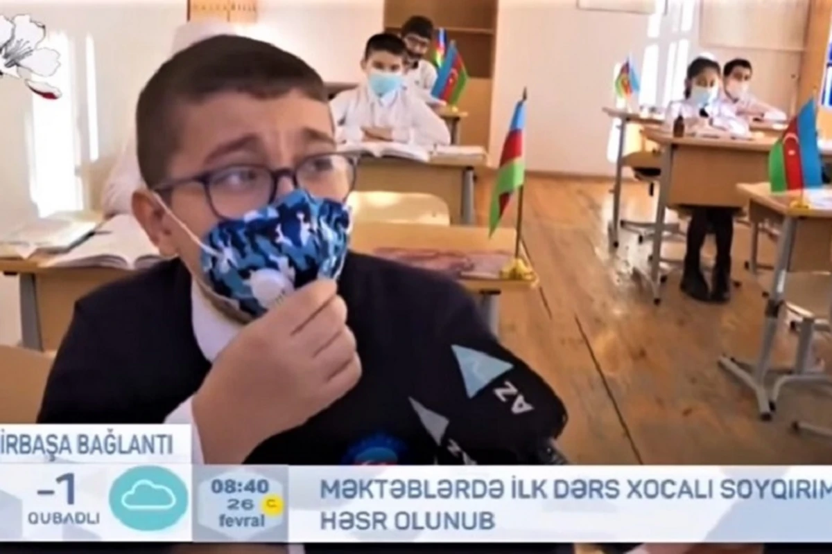 Xocalı soyqırımından danışan şagird göz yaşlarına boğuldu - VİDEO Xocalı soyqırımından danışan şagird göz yaşlarına boğuldu - VİDEO