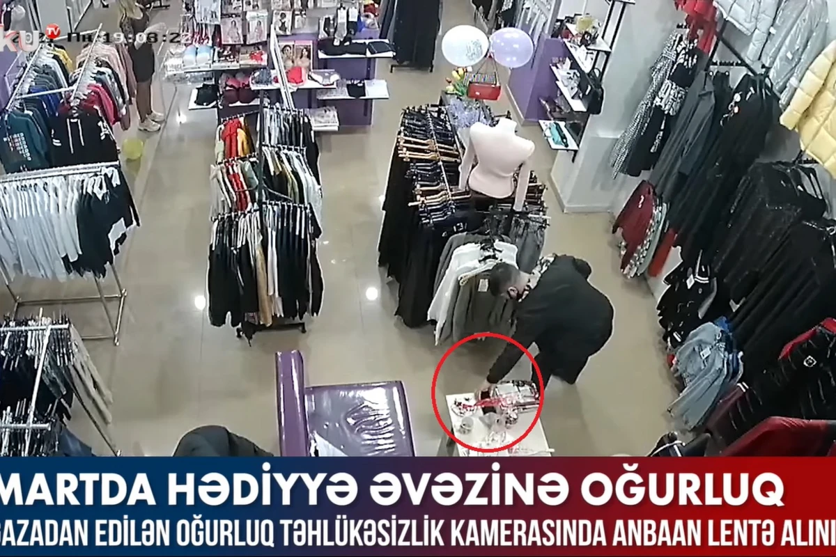 На камеры попала кража в бакинском магазине одежды - ВИДЕО