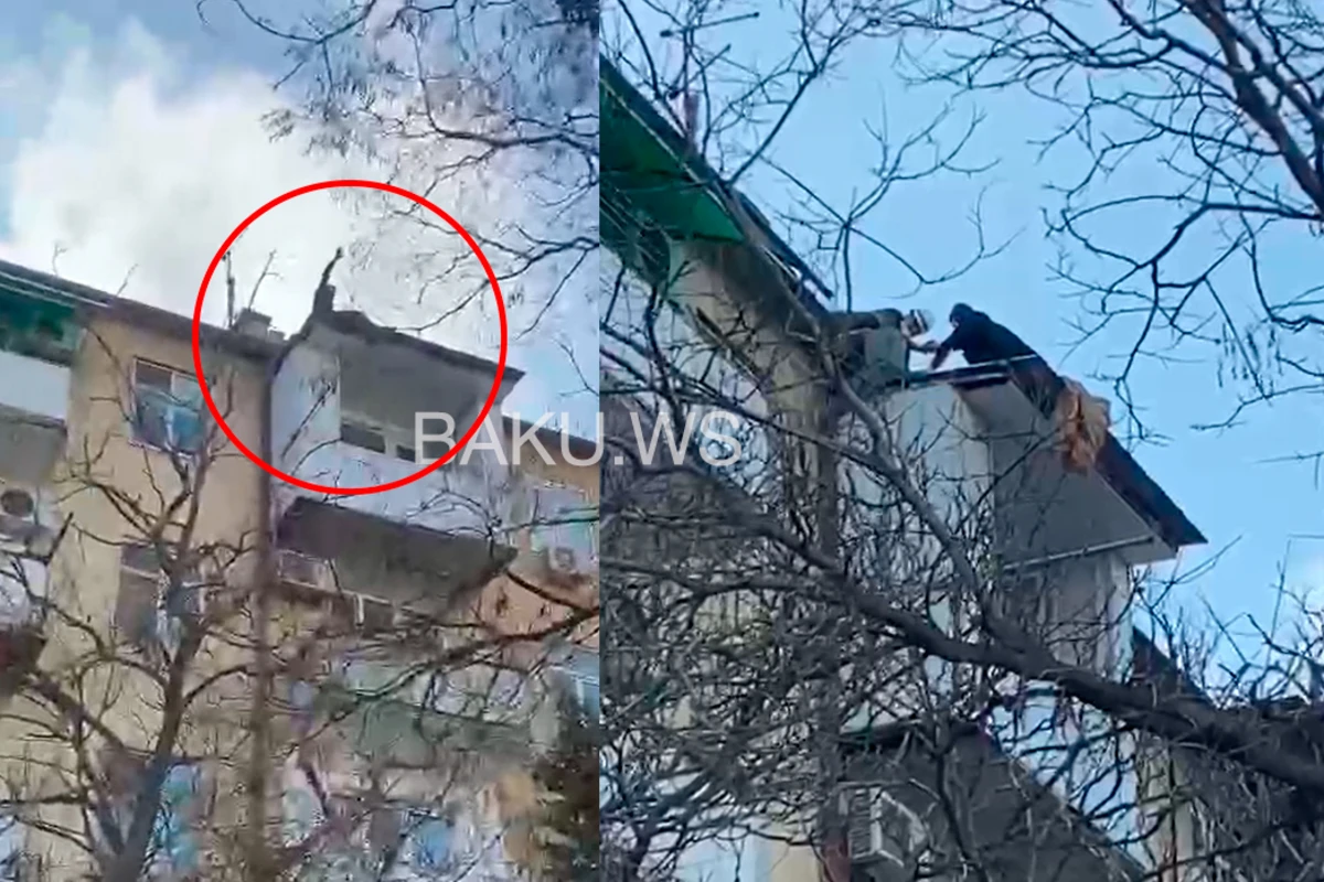 Bakıda kişi özünü binadan atmaq istədi - VİDEO