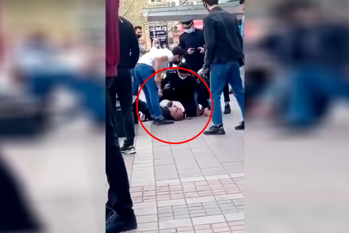 Скандал между полицией и гражданином из-за маски вызвал переполох в центре Баку - ВИДЕО