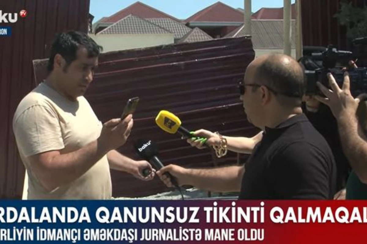 Nazirliyin idmançı əməkdaşı jurnalisti hədələdi – VİDEO