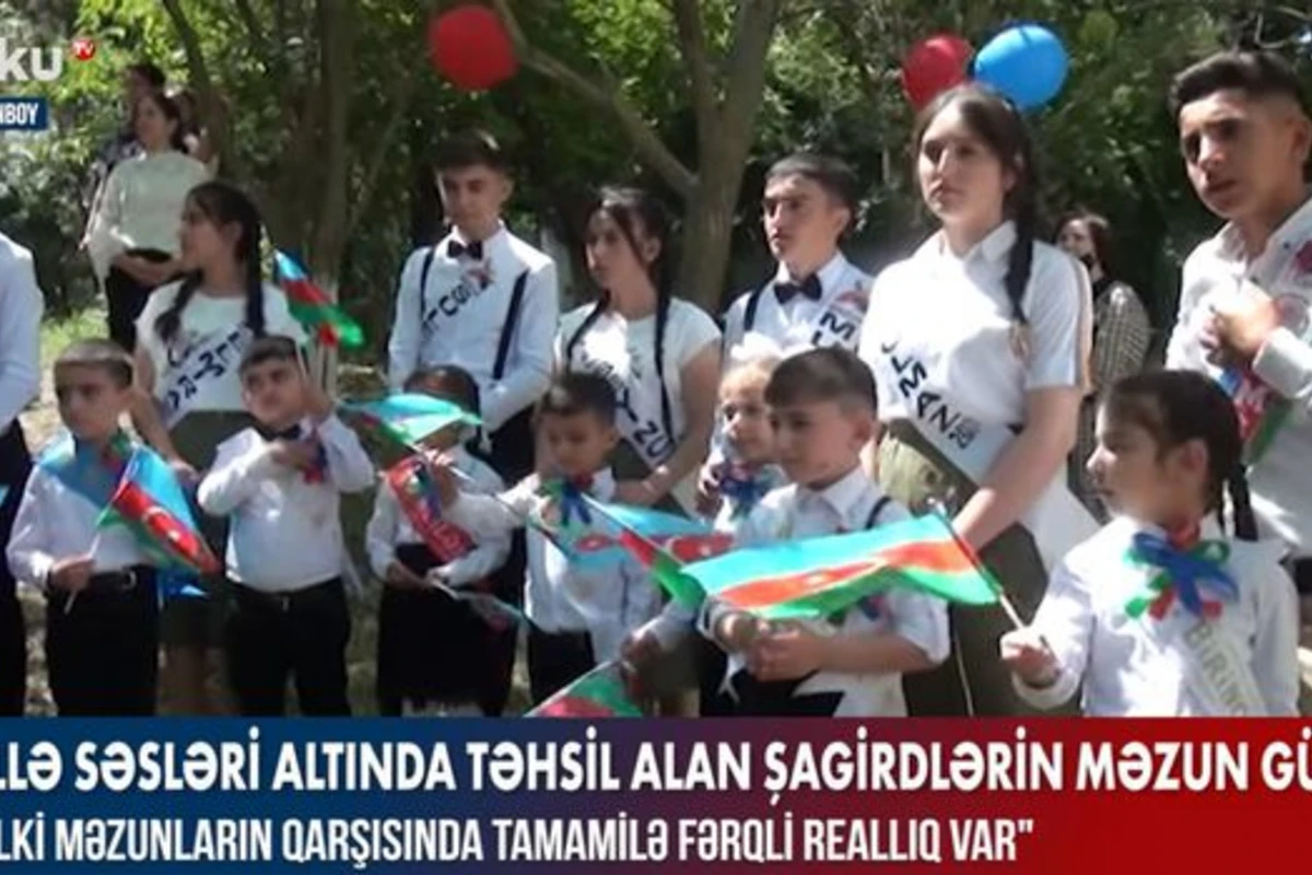 Güllə səsləri altında təhsil alan şagirdlərin məzun günü – VİDEO