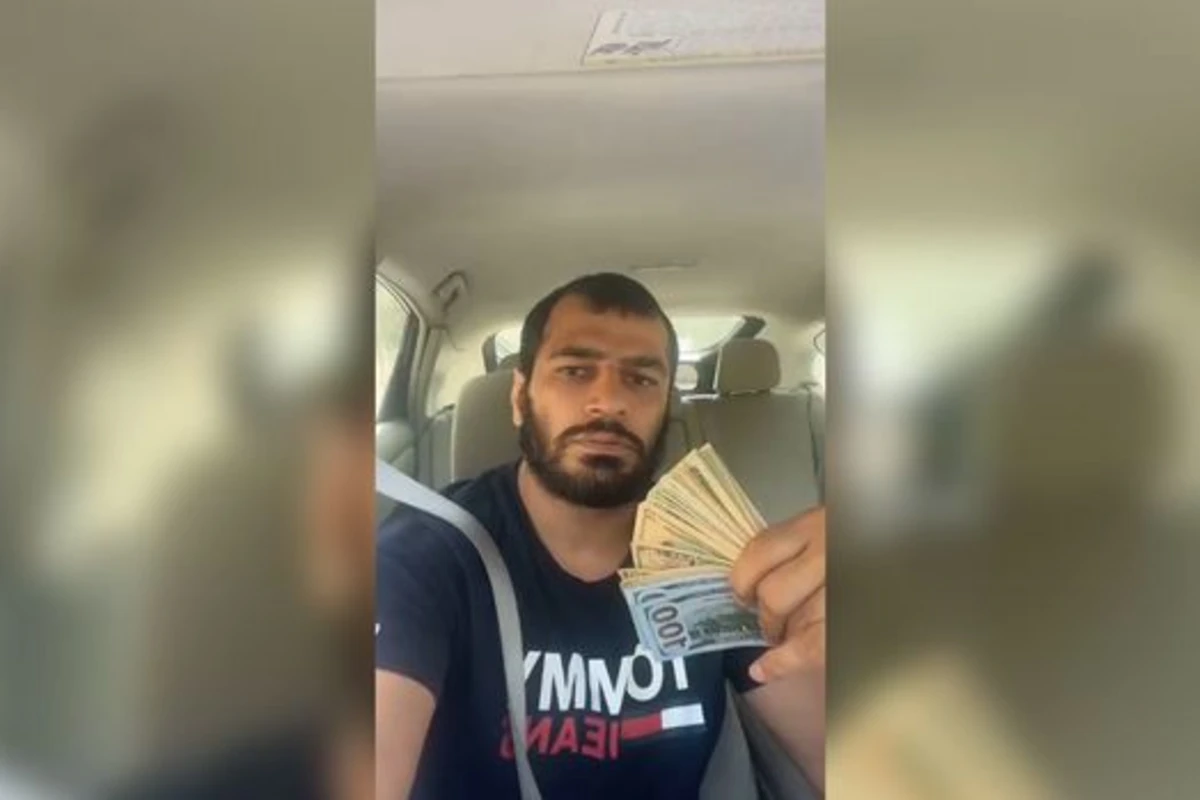 Məşhur azərbaycanlı cüdoçu bu dəfə dollarla özünü yellədi - VİDEO