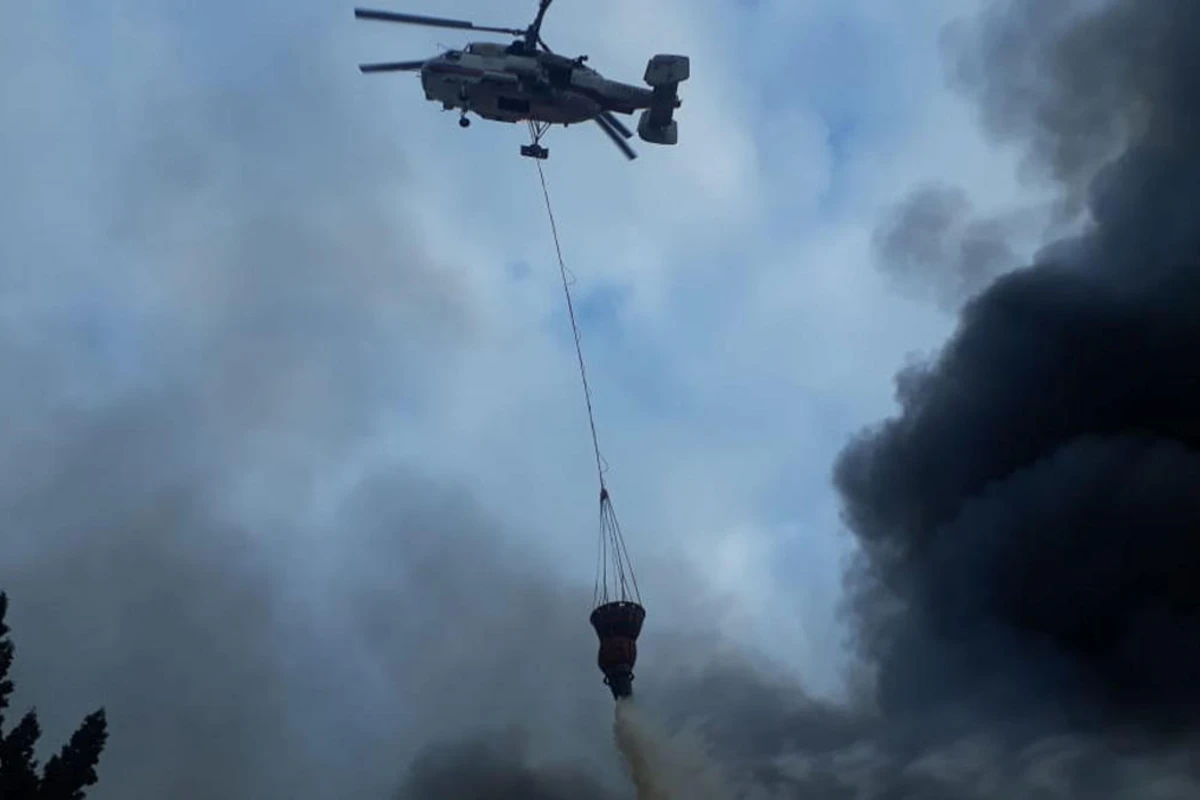 Oğuzda meşə yanğınının söndürülməsinə helikopter cəlb olunub