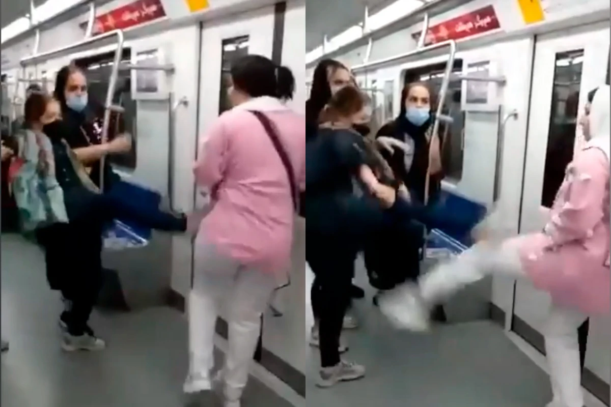 Tehran metrosunda maska üstündə qızlar təpik davasına çıxdılar - VİDEO