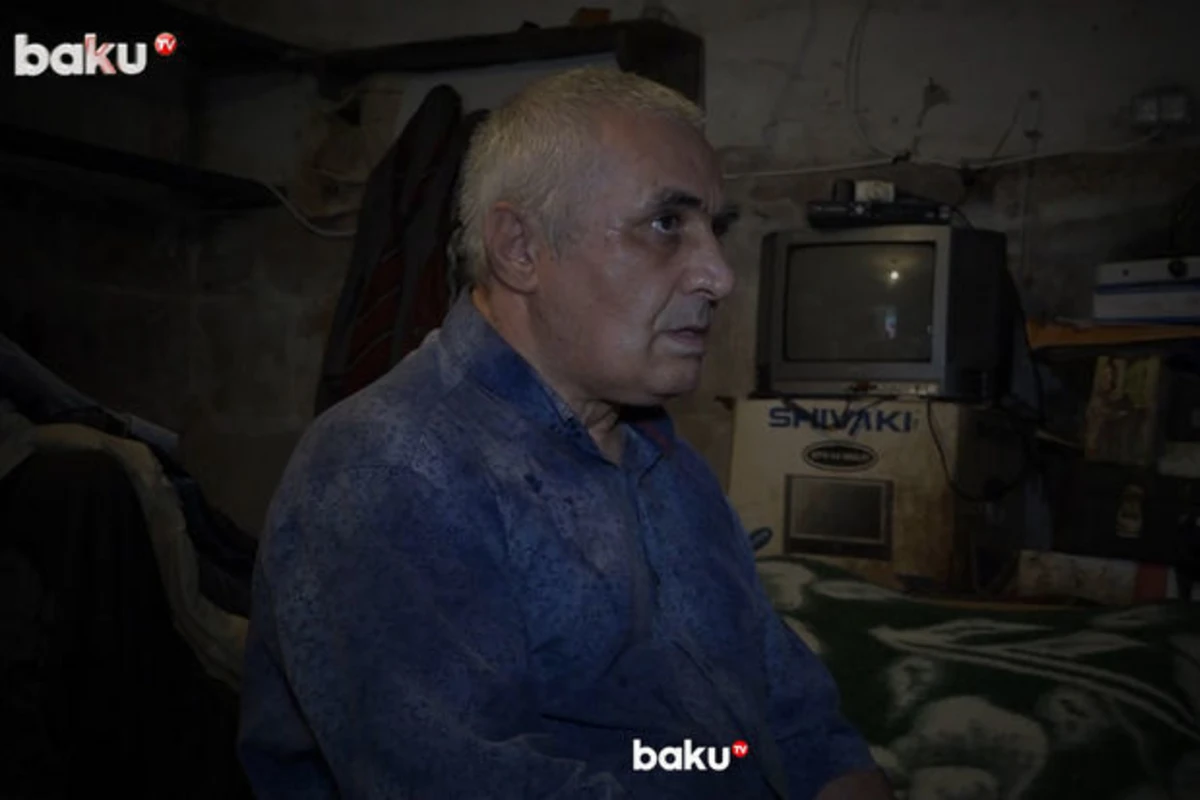 Житель Баку 10 лет вынужден жить в гараже - ВИДЕО