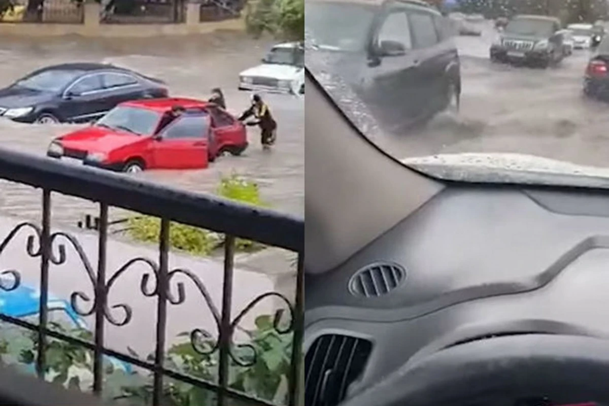 Сильный дождь создал трудности для водителей в Баку - ВИДЕО