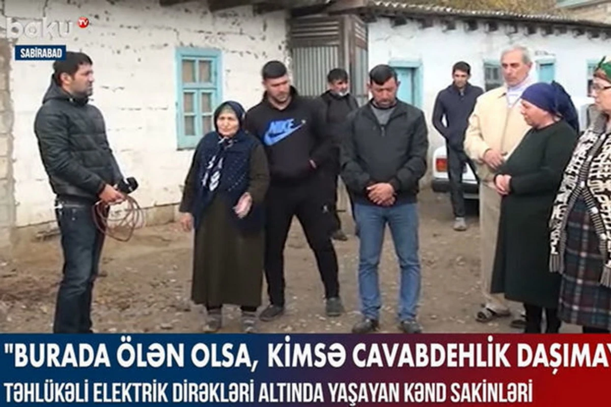 Жители села, живущие под опасными электрическими столбами - ВИДЕО