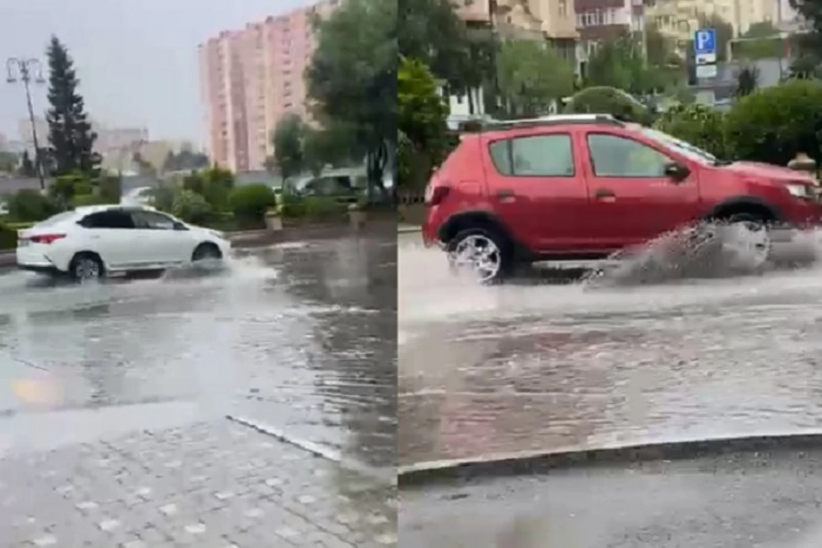 Yağışlı havada PROBLEM: Piyadalar yolu keçə bilmirlər - VİDEO