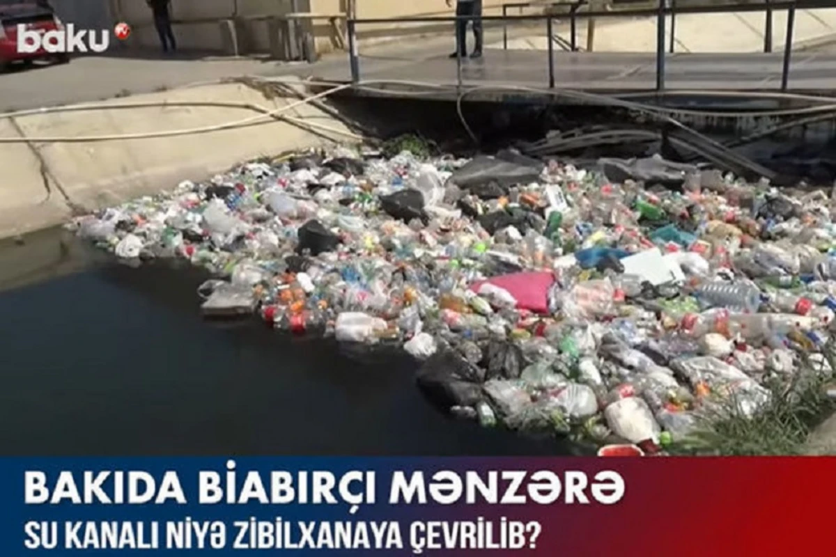 Ужасающая картина в Баку: жители выбрасывают мусор в канал - ВИДЕО