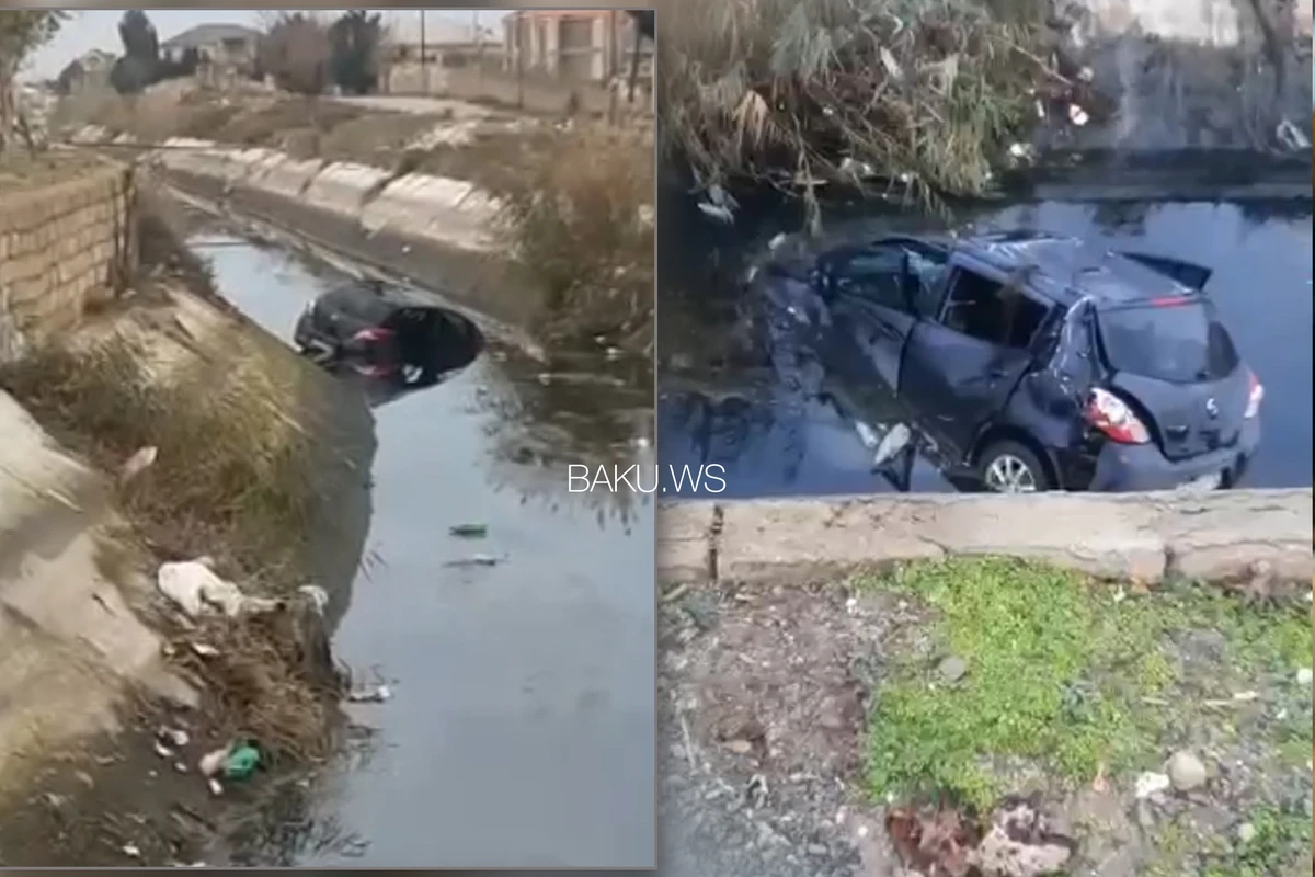 Xanım sürücünün idarə etdiyi avtomobil kanala düşdü - VİDEO